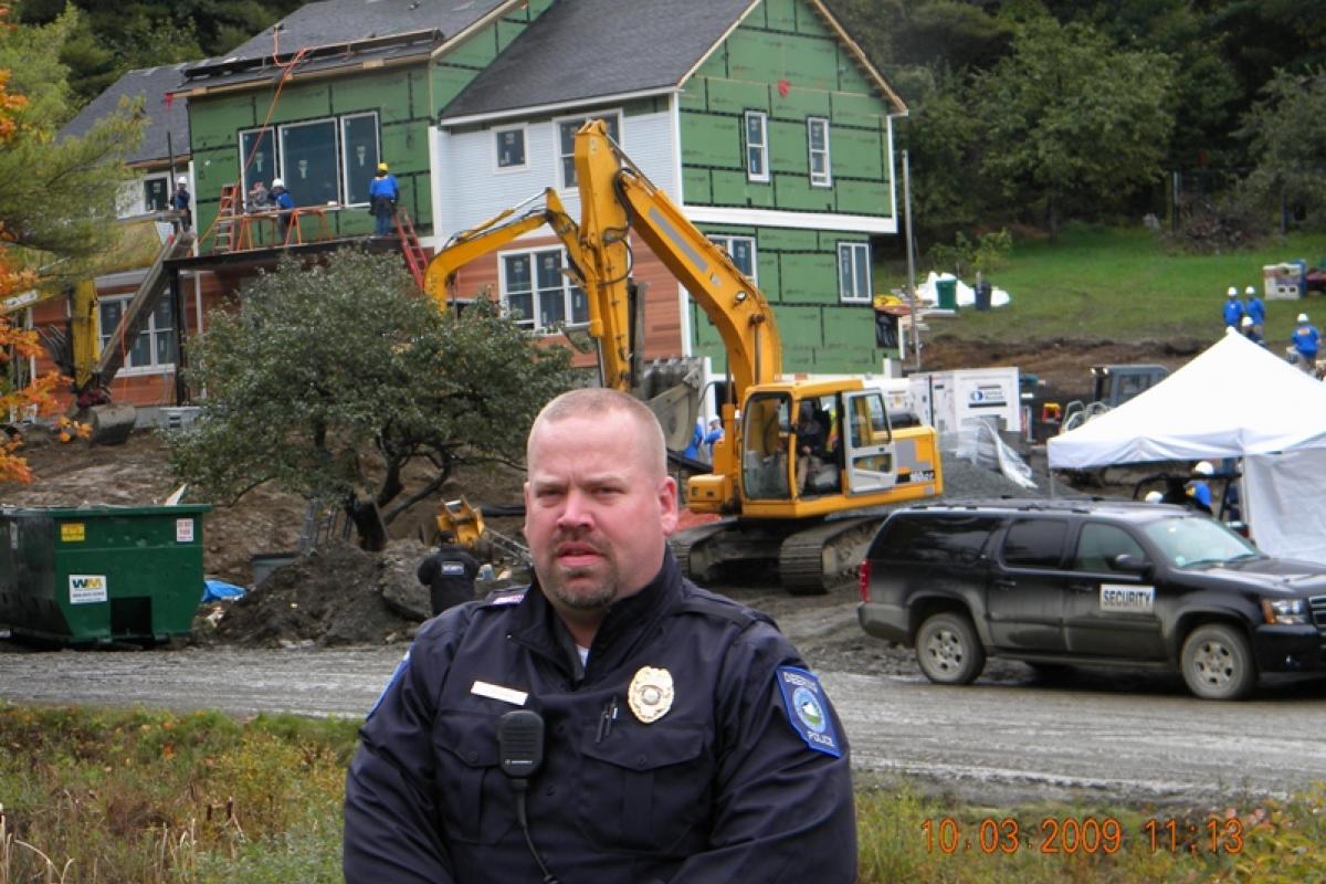 Officer with Building in Background