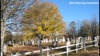 cemetery in fall with white fence
